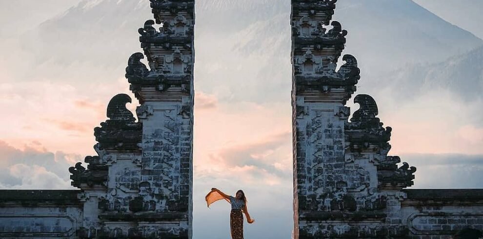 Tourists capturing photos at the Gates of Heaven in Bali