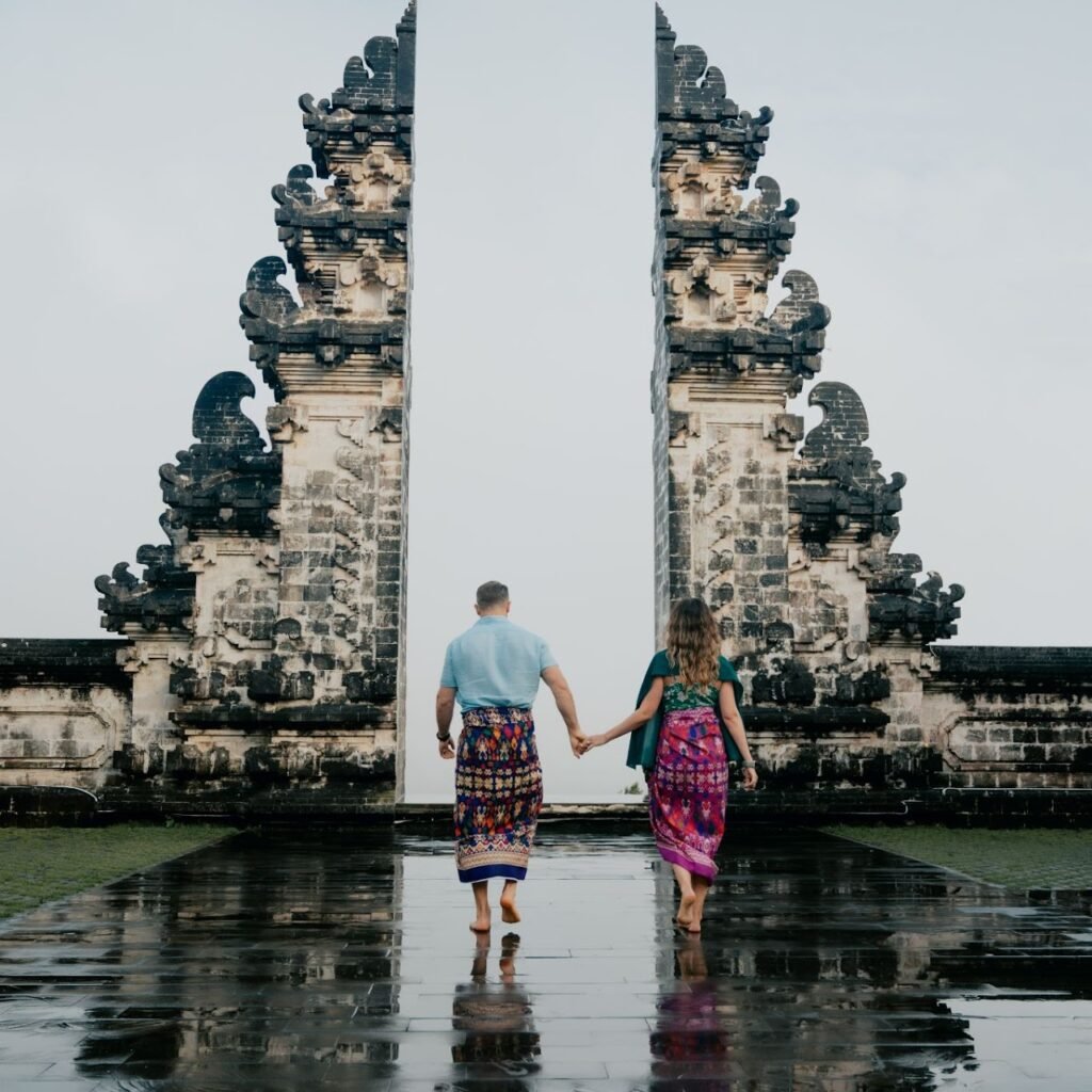 Tourists capturing photos at the Gates of Heaven in Bali