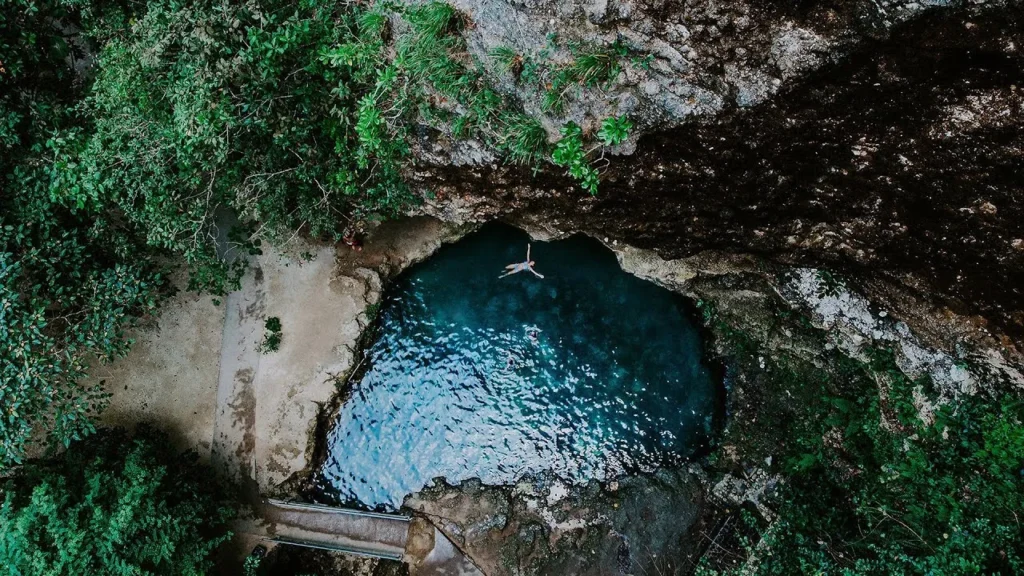 Tourists exploring hidden natural pools in Nusa Penida